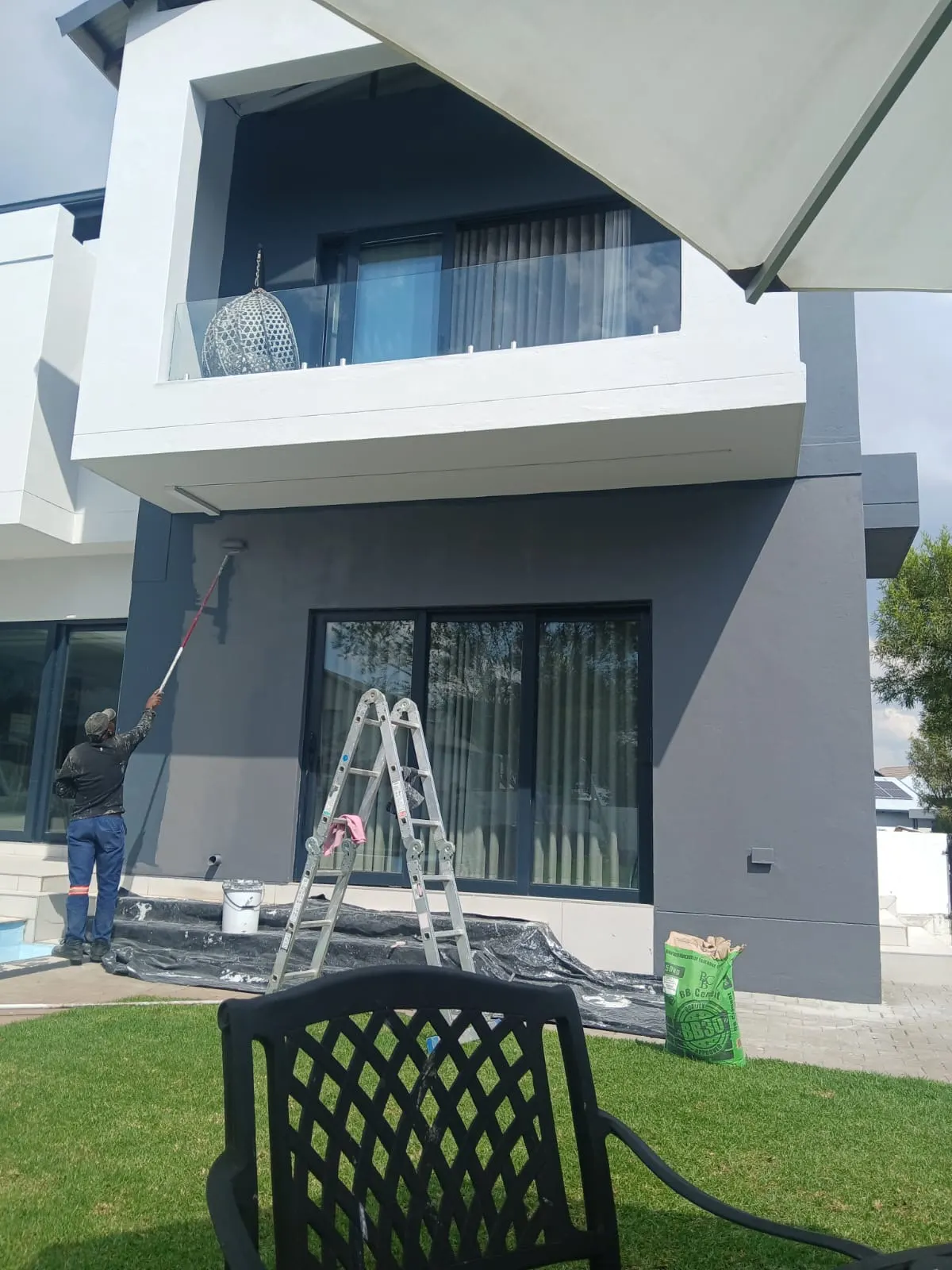 Professional spray painter applying high-quality paint finish in Johannesburg