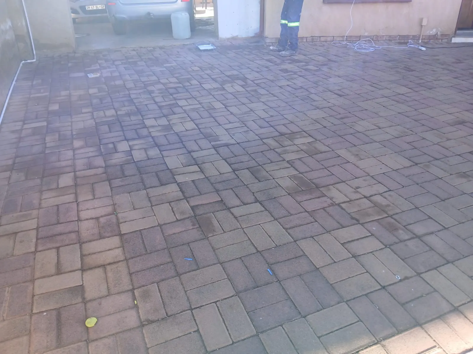 K-Son professional team working on driveway paving restoration project